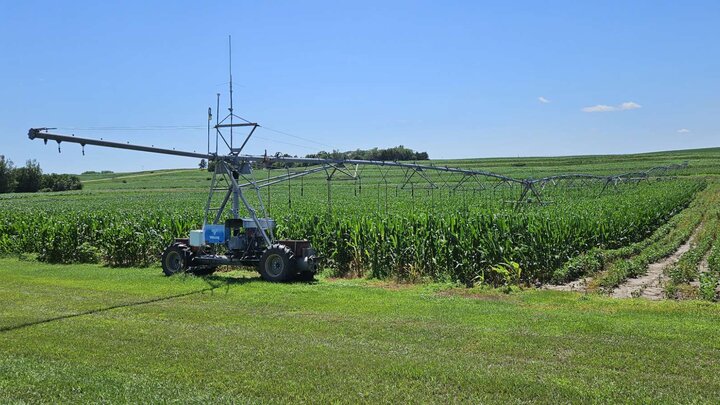 image of lateral irrigation going over corn and soybeans